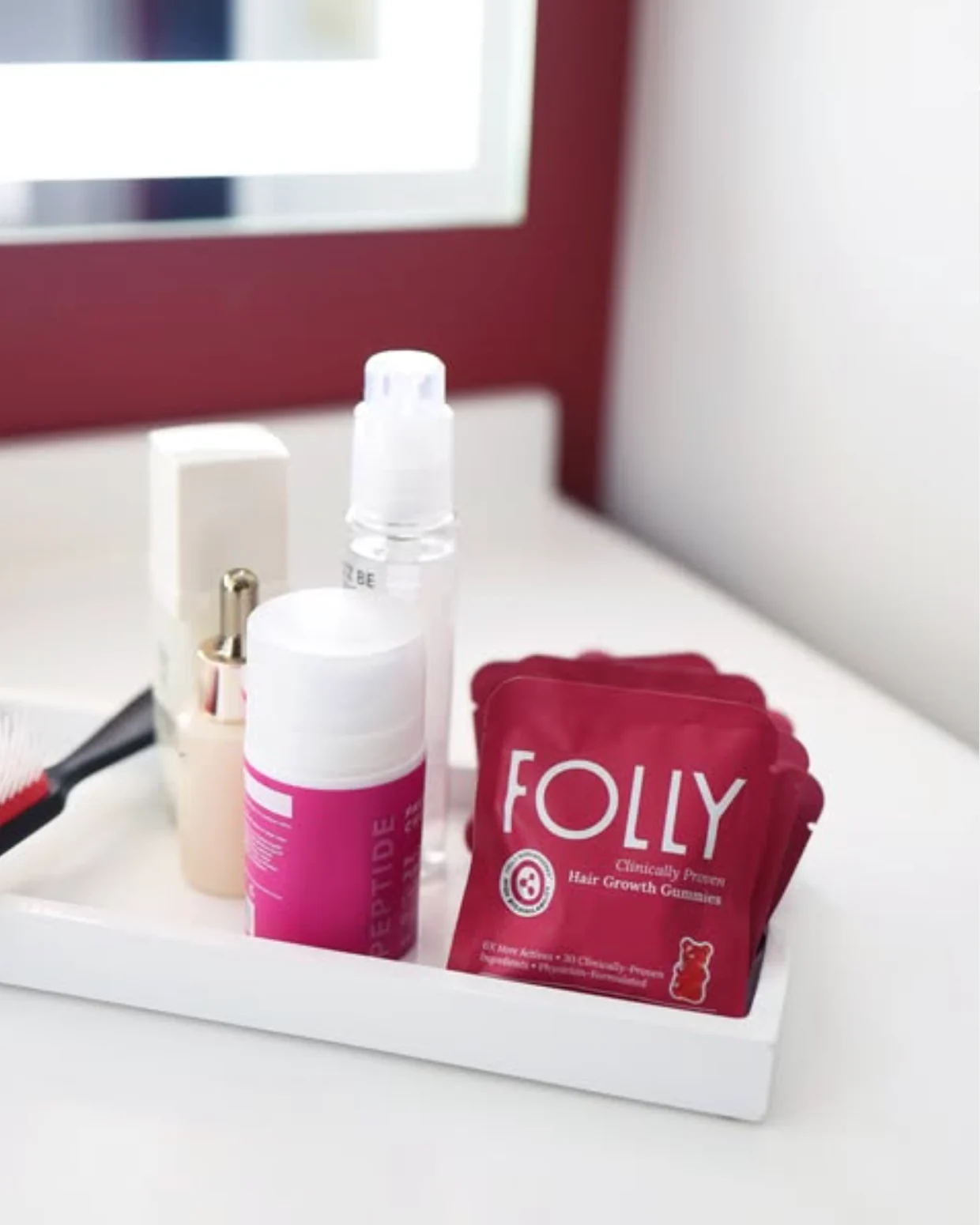 Folly sachet styled beside a bathroom sink